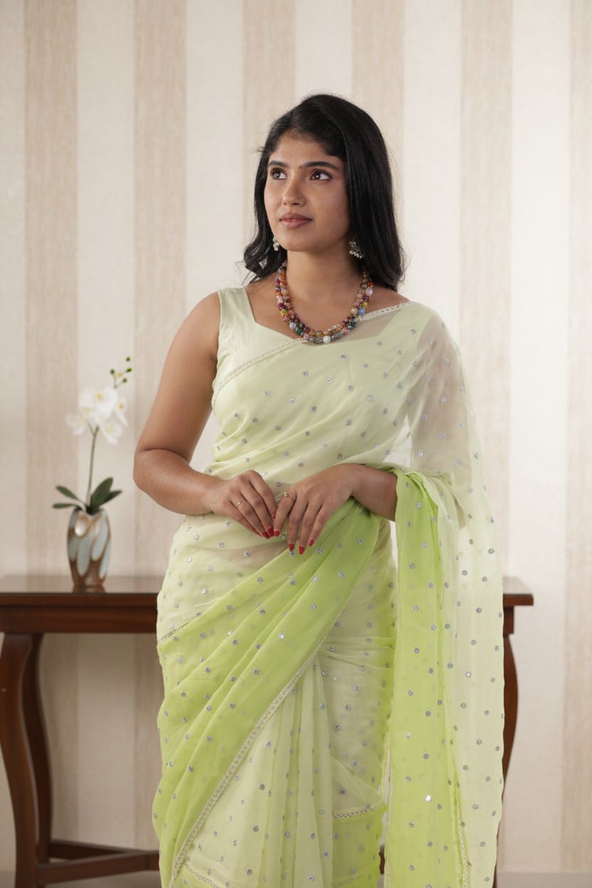 Luxurious red bridal silk saree with gold embellishments